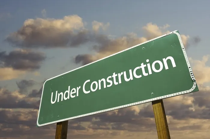 Framed Print : Under Construction Road Sign Print over Dramatic Clouds Framed Print : Under Construction Road Sign Print over Dramatic Clouds