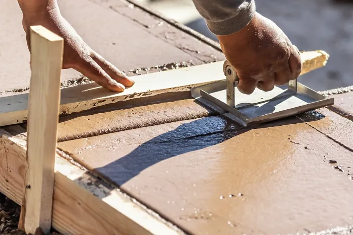 Framed Print : Construction Worker Using Hand Groover On Wet Cement Print Framed Print : Construction Worker Using Hand Groover On Wet Cement Print