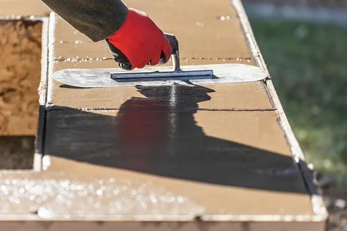 Framed Print : Construction Worker Using Trowel On Wet Cement Print