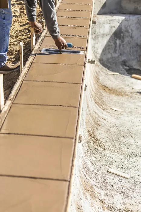Framed Print : Construction Worker Using Trowel on Wet Cement Print