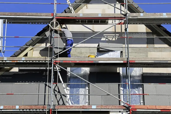 Framed Print : Construction Workers Insulate House Facade Print Framed Print : Construction Workers Insulate House Facade Print