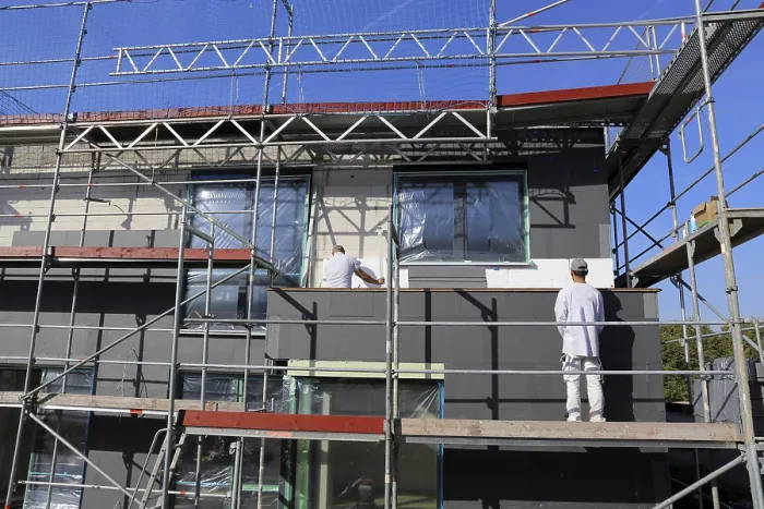 Framed Print : Construction Workers Insulate House Facade Print Framed Print : Construction Workers Insulate House Facade Print