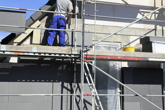 Framed Print : Construction Workers Insulate House Facade Print Framed Print : Construction Workers Insulate House Facade Print