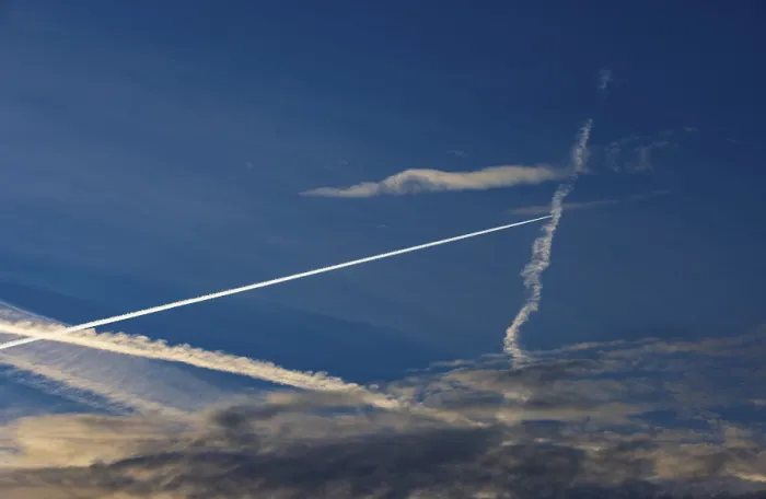 Framed Print : Contrails intersect in the evening sky Print, Austria Framed Print : Contrails intersect in the evening sky Print, Austria