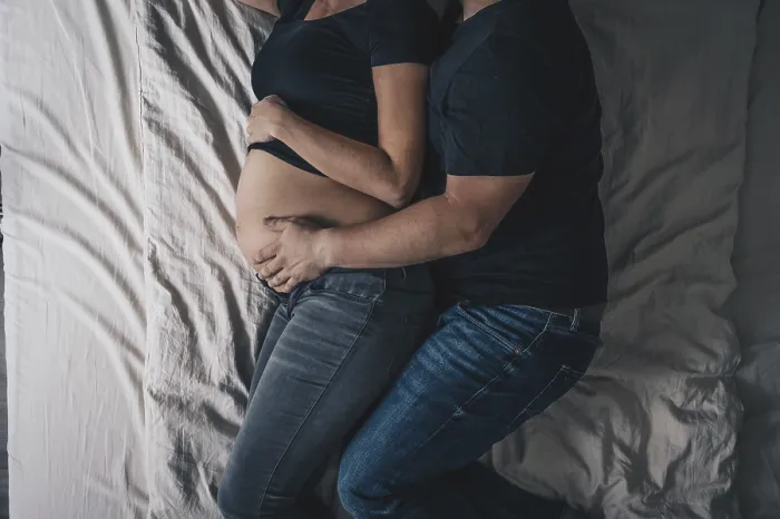 Framed Print : Pregnant Couple in Bed Print Framed Print : Pregnant Couple in Bed Print