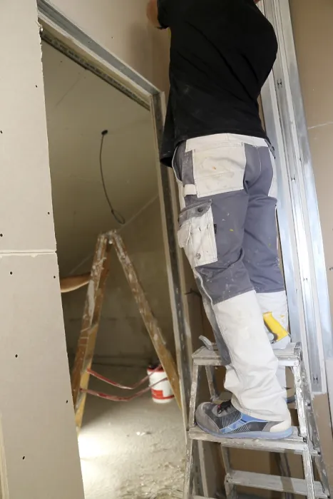 Framed Print : Craftsmen doing drywall work Print