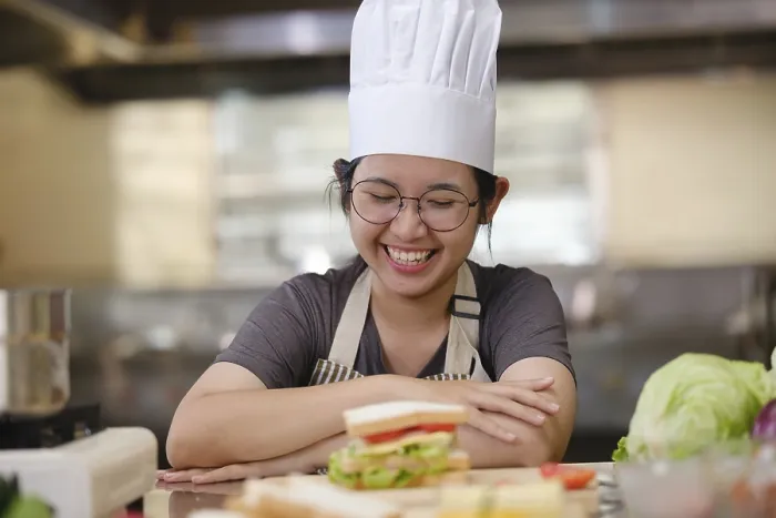 Framed Print : A Culinary Student in a Professional Training Kitchen Print Framed Print : A Culinary Student in a Professional Training Kitchen Print