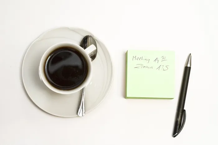 Framed Print : Cup of coffee and note pad with ball pen Print Framed Print : Cup of coffee and note pad with ball pen Print