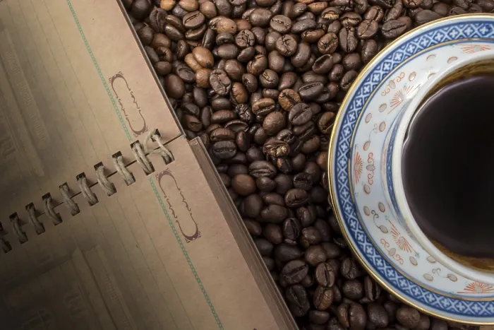 Framed Print : Coffee Background Print with Cup and Notebook Framed Print : Coffee Background Print with Cup and Notebook