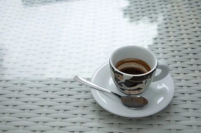 Framed Print : Cup of Coffee Print on White Table Framed Print : Cup of Coffee Print on White Table