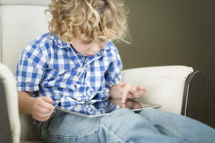 Framed Print : Cute Young Boy Using Tablet Print Framed Print : Cute Young Boy Using Tablet Print