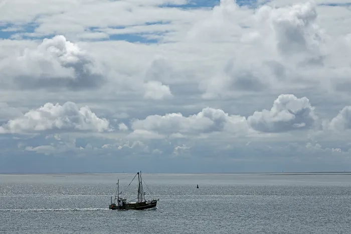 Framed Print : Cutter in front of Busum, clouds, backlight Print Framed Print : Cutter in front of Busum, clouds, backlight Print