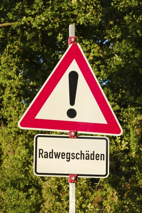 Framed Print : Cycle path damage, traffic sign Print, Emsland, Germany Framed Print : Cycle path damage, traffic sign Print, Emsland, Germany