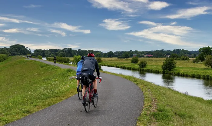 Framed Print : Cyclist on a Cycle Path by the River, Lower Oder Valley National Park Print Framed Print : Cyclist on a Cycle Path by the River, Lower Oder Valley National Park Print