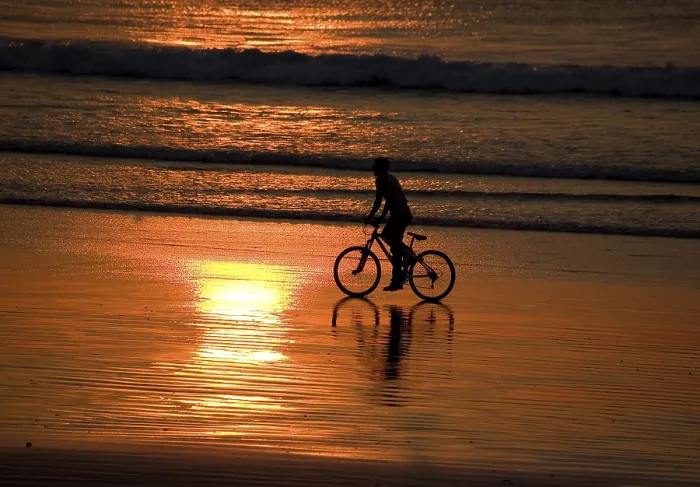 Framed Print : Cyclist at Sunset on the Beach Print Framed Print : Cyclist at Sunset on the Beach Print
