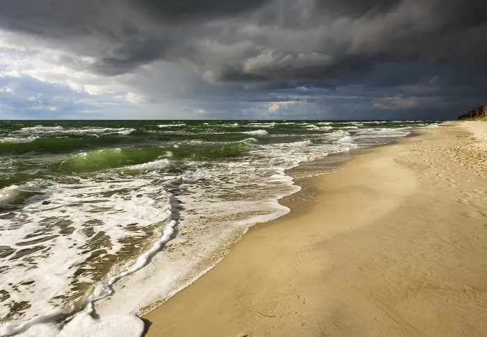 Framed Print : Dark Rain Clouds Print over Weststrand Beach, Germany Framed Print : Dark Rain Clouds Print over Weststrand Beach, Germany