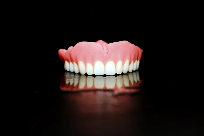 Framed Print : Upper Jaw Plastic Denture Print, Studio Shot Framed Print : Upper Jaw Plastic Denture Print, Studio Shot