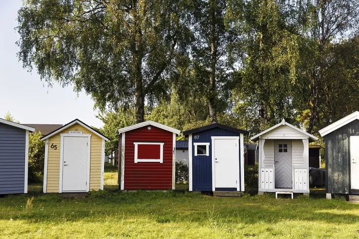 Framed Print : Different Colored Beach Huts in a Meadow Print, Ystad Sweden Framed Print : Different Colored Beach Huts in a Meadow Print, Ystad Sweden