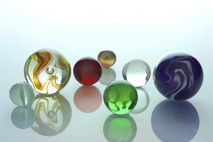 Framed Print : Colored Marbles on Mirror Print Framed Print : Colored Marbles on Mirror Print