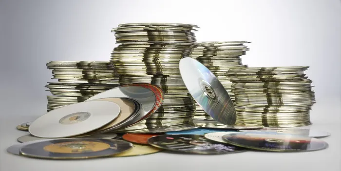 Framed Print : Discarded DVDs and CDs Print by imageBROKER Framed Print : Discarded DVDs and CDs Print by imageBROKER