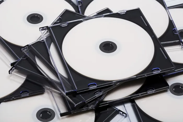 Framed Print : Disks in Boxes Print: CD Storage Background