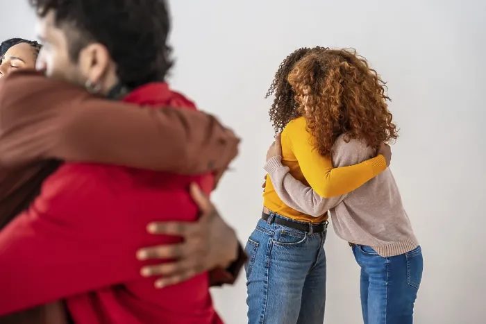 Framed Print : Diverse Group Embracing in a Supportive Circle Print Framed Print : Diverse Group Embracing in a Supportive Circle Print