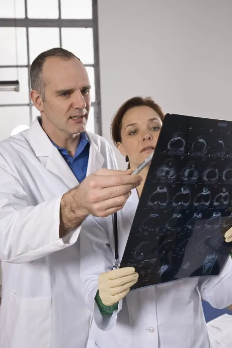 Framed Print : Two Doctors Examining an X-ray Print Framed Print : Two Doctors Examining an X-ray Print