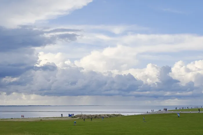 Framed Print : Dramatic clouds over the North Sea Print, Norddeich, Germany Framed Print : Dramatic clouds over the North Sea Print, Norddeich, Germany
