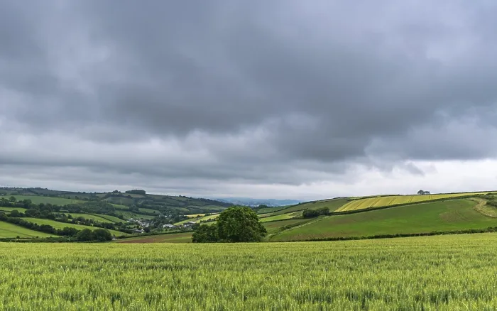 Framed Print : Dramatic Clouds Print over Labrador Bay, Devon, England