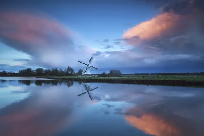 Framed Print : Dramatic Stormy Sunset Print over Dutch Windmill and River Framed Print : Dramatic Stormy Sunset Print over Dutch Windmill and River