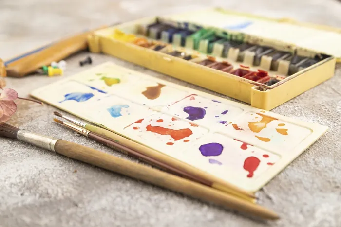 Framed Print : Drawing Accessories Print: Brushes and Pencils on Concrete