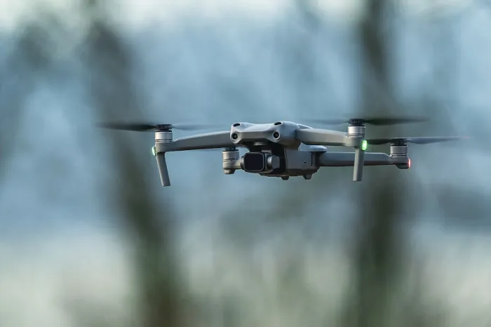 Framed Print : Drone in flight over marshland Print, Devon, England Framed Print : Drone in flight over marshland Print, Devon, England