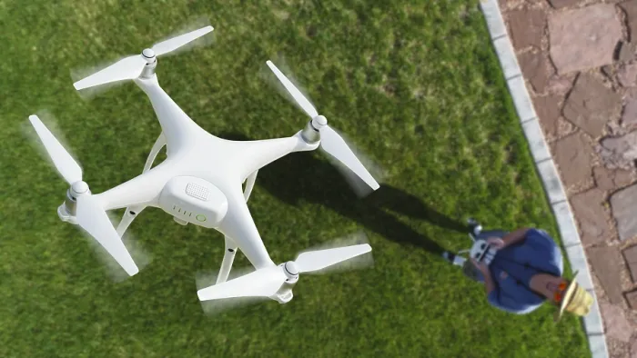 Framed Print : Drone Quadcopter Print: Pilot and Remote Controller Framed Print : Drone Quadcopter Print: Pilot and Remote Controller