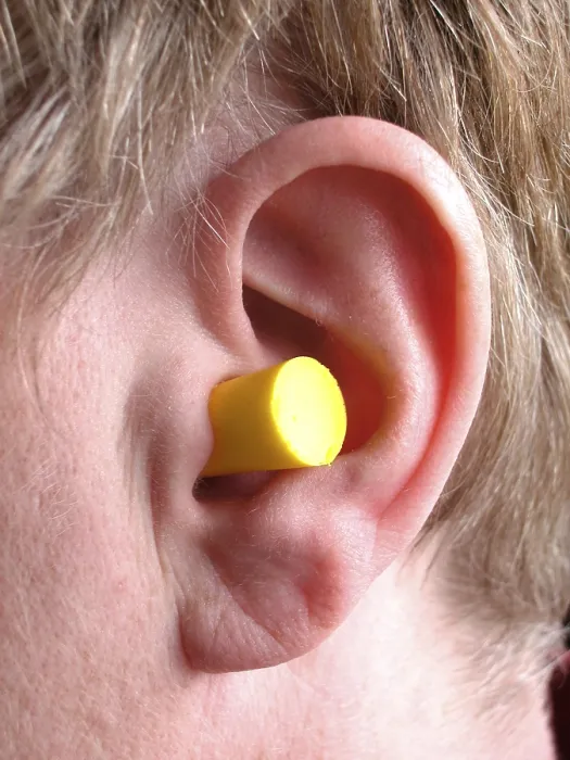 Framed Print : Ear with ear stopper Print Framed Print : Ear with ear stopper Print
