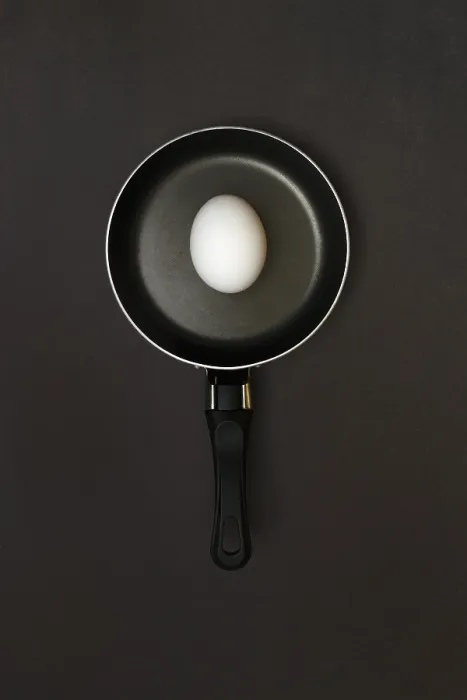 Framed Print : Egg in Pan Print on Dark Background Framed Print : Egg in Pan Print on Dark Background