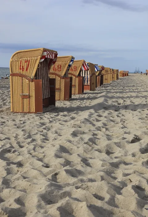 Framed Print : Empty, Locked Beach Chairs on Poel Island Print