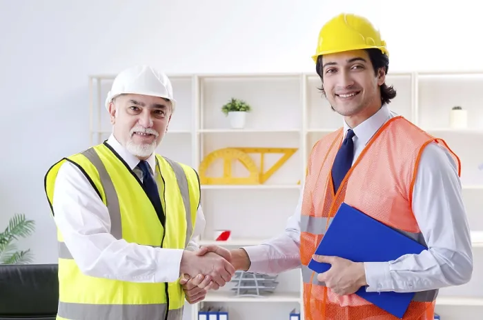 Framed Print : Two engineers colleagues working under project Print