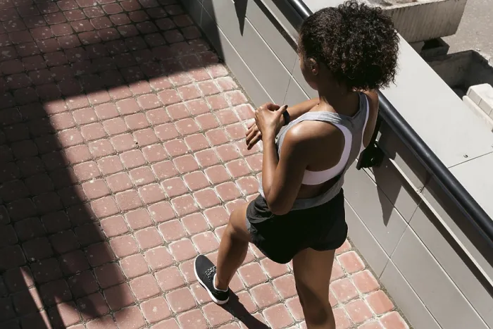 Framed Print : Female Jogger Activity Tracker Print, High Angle View