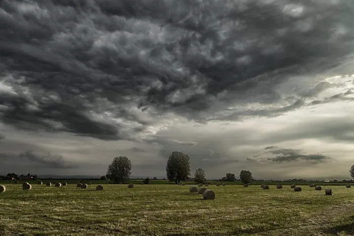 Framed Print : Romagna Hay Bales Print under Dark Clouds Framed Print : Romagna Hay Bales Print under Dark Clouds