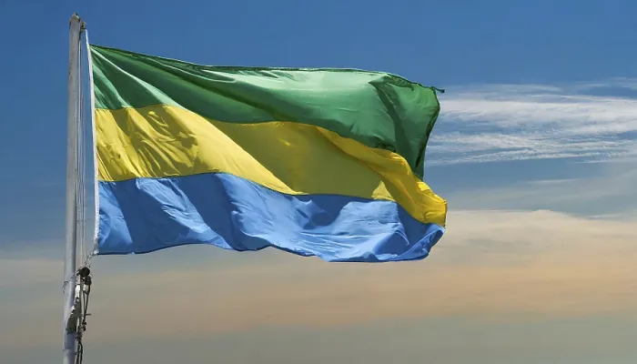 Framed Print : The Flag of Gabon Print, Isolated Against Blue Sky Framed Print : The Flag of Gabon Print, Isolated Against Blue Sky