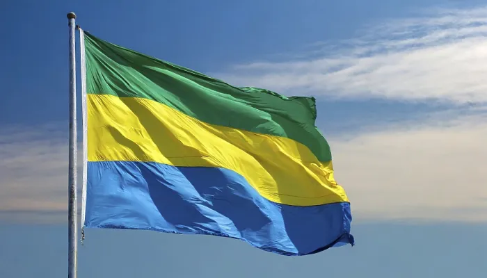 Framed Print : The Flag of Gabon Print, Isolated Against Blue Sky Framed Print : The Flag of Gabon Print, Isolated Against Blue Sky