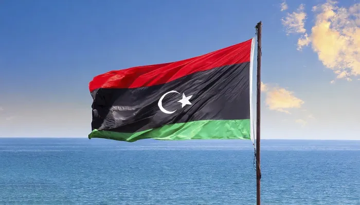 Framed Print : The Flag of Libya Print - Isolated Against Blue Sky Framed Print : The Flag of Libya Print - Isolated Against Blue Sky