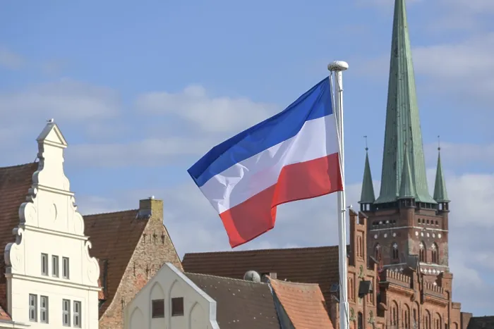 Framed Print : Flag of Schleswig-Holstein Print in Lubeck, Germany Framed Print : Flag of Schleswig-Holstein Print in Lubeck, Germany