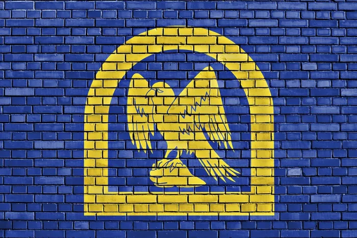 Framed Print : Flag of Wing Painted on Brick Wall Print Framed Print : Flag of Wing Painted on Brick Wall Print