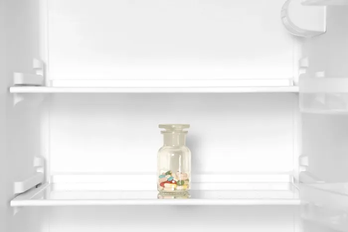 Framed Print : Empty Fridge with Vitamin Tablets Print Framed Print : Empty Fridge with Vitamin Tablets Print