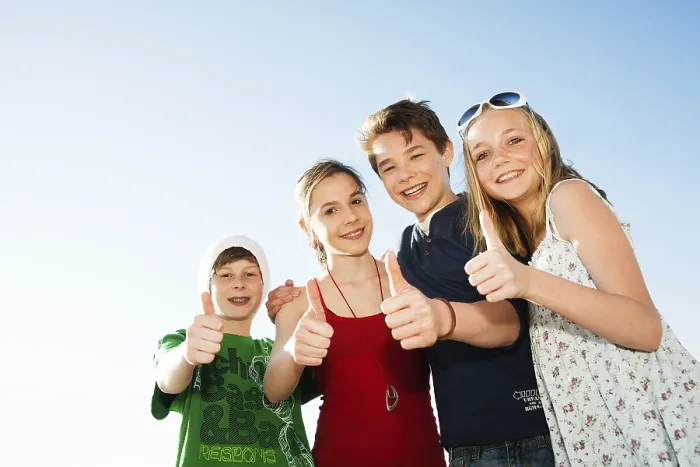 Framed Print : Four Friends Standing Together with Thumbs Up Print Framed Print : Four Friends Standing Together with Thumbs Up Print