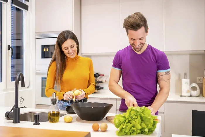 Framed Print : Frontal View of Couple Preparing Salad Print at Home Framed Print : Frontal View of Couple Preparing Salad Print at Home