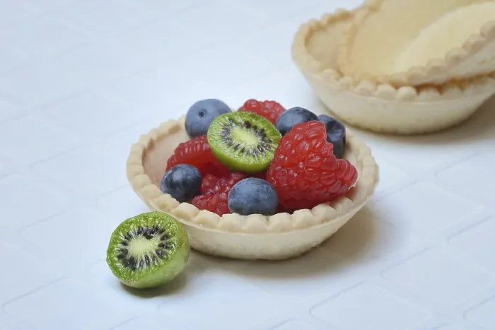 Framed Print : Raspberry, Blueberry, Mini Kiwi Fruit on Tartlet Base Print Framed Print : Raspberry, Blueberry, Mini Kiwi Fruit on Tartlet Base Print