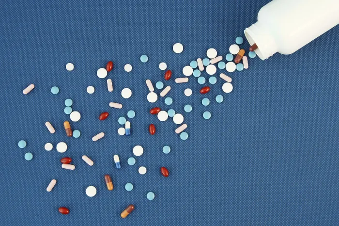 Framed Print : Print of Assorted Tablets and Capsules on Blue Background Framed Print : Print of Assorted Tablets and Capsules on Blue Background