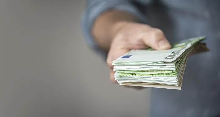 Framed Print : Hand Giving a Stack of Euro Bills Print Framed Print : Hand Giving a Stack of Euro Bills Print